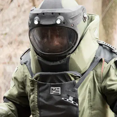 EOD technician in a bomb suit helmet